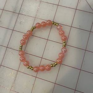 Pink pearl and gold bracelet